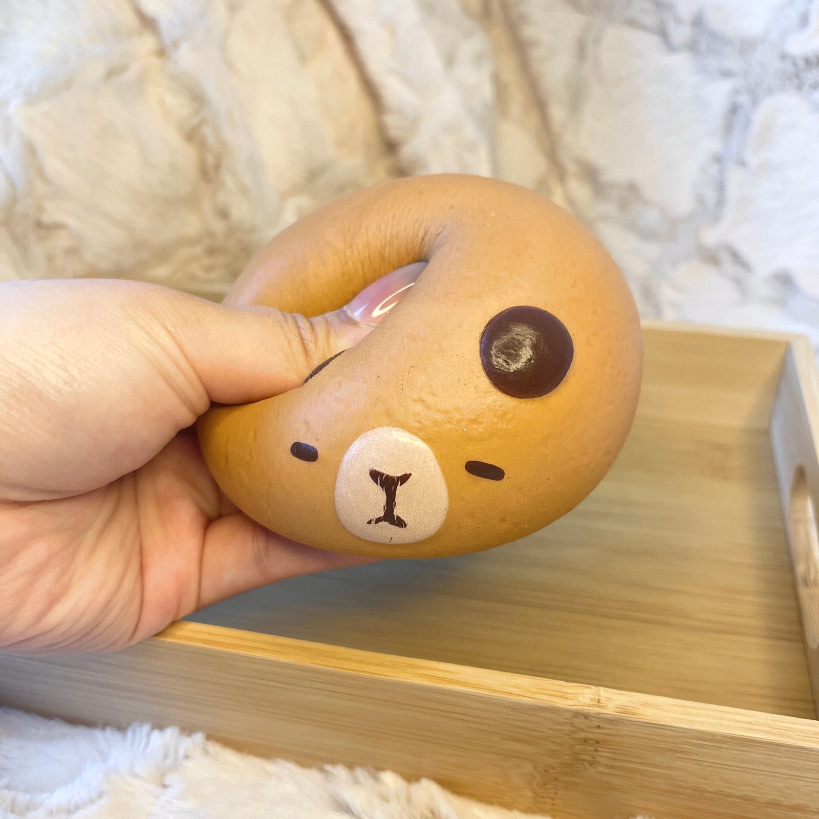 Capybara mochi bun squeezing view