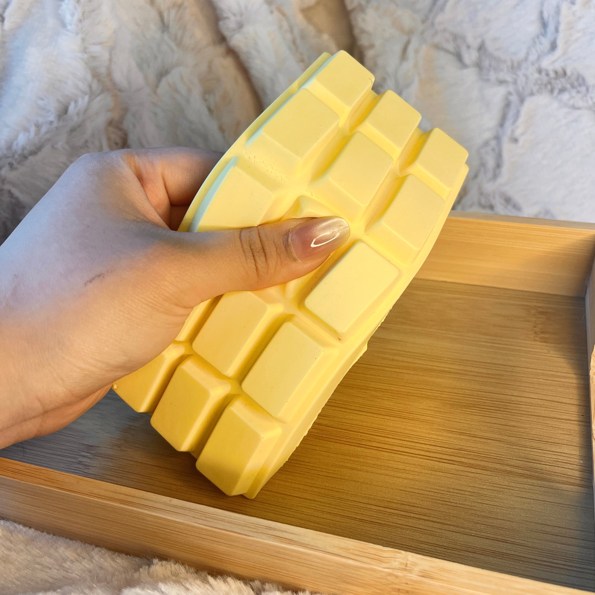 White chocolate bar squeezing view